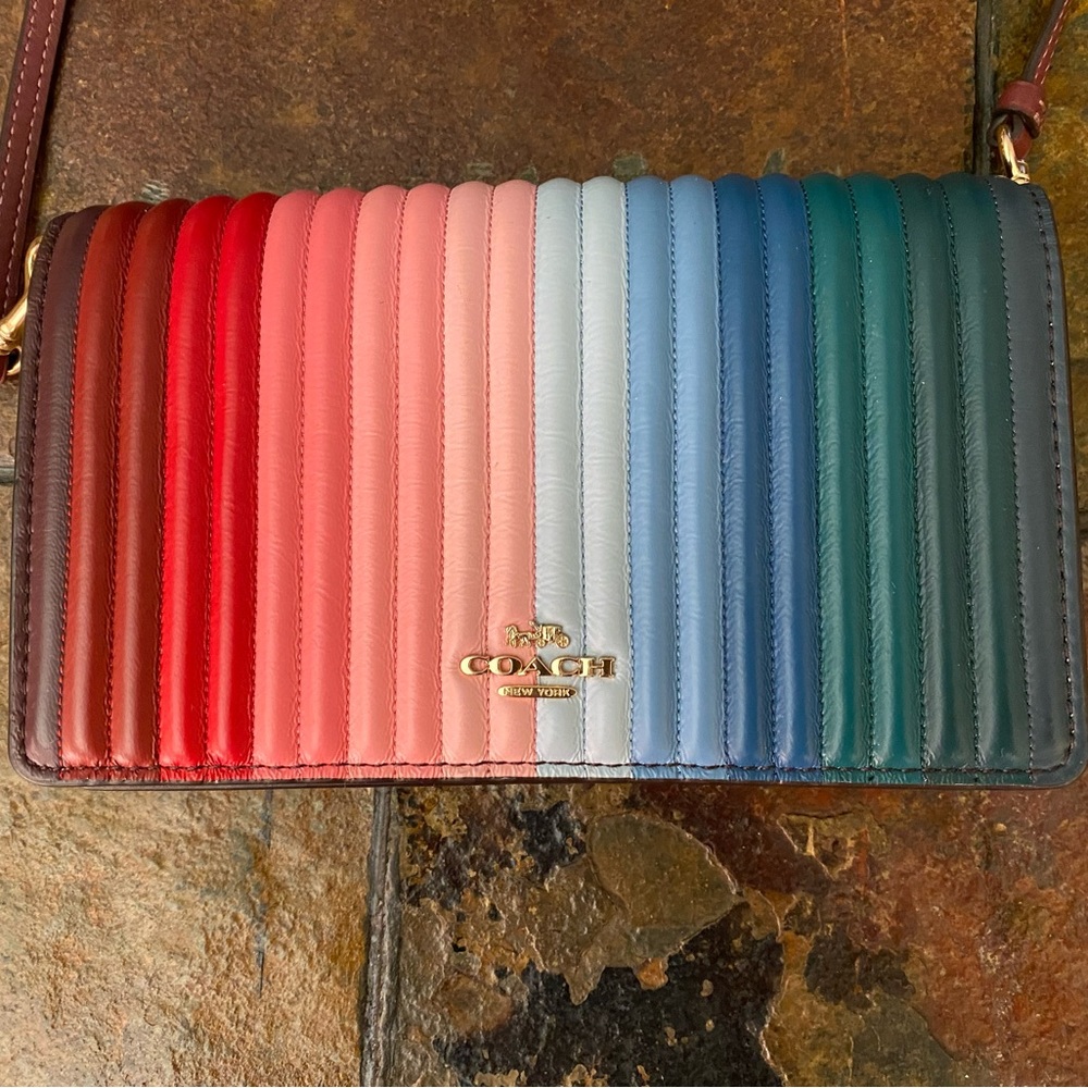 Coach clutch/mini shoulder bag. Multi colored, removable strap, zip pocket.